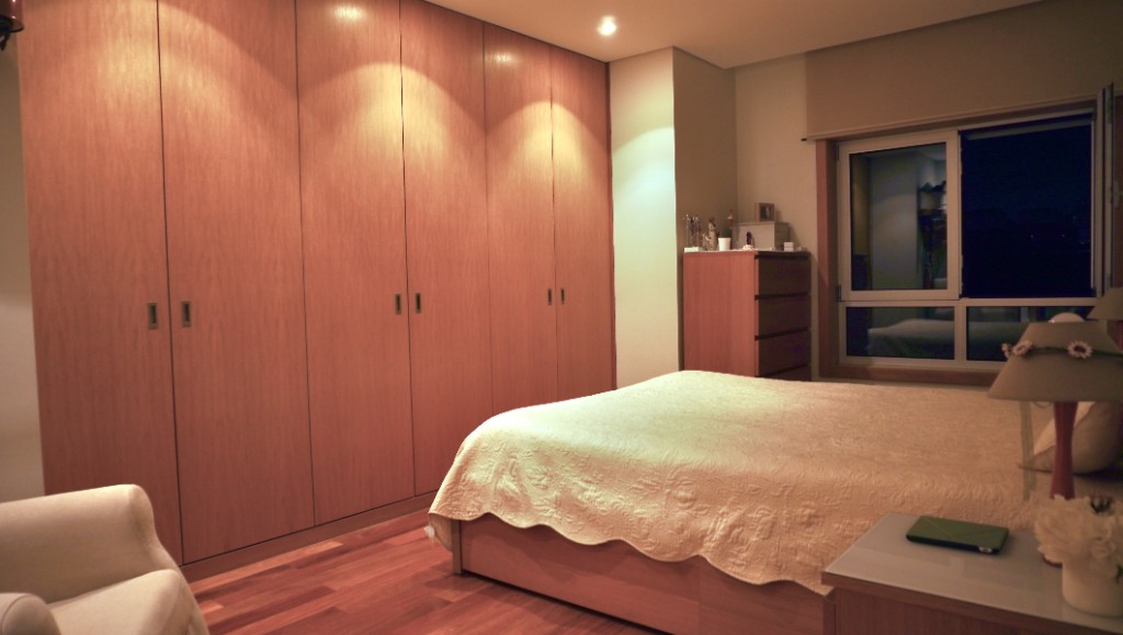 Bedroom listing photo before visual improvement in low evening light